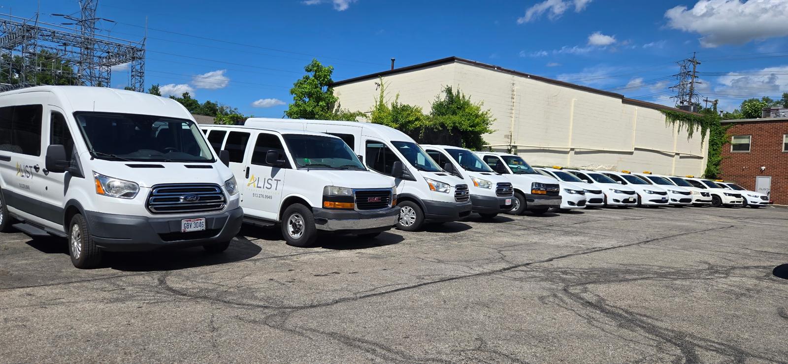 A-List passenger vans lined up and ready